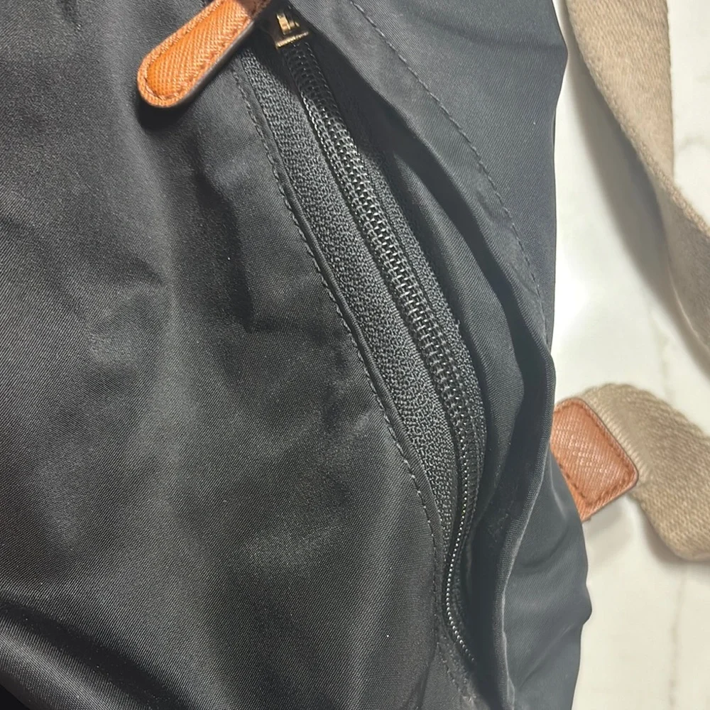 Michael Kors Black and Tan Backpack with Leather Accents